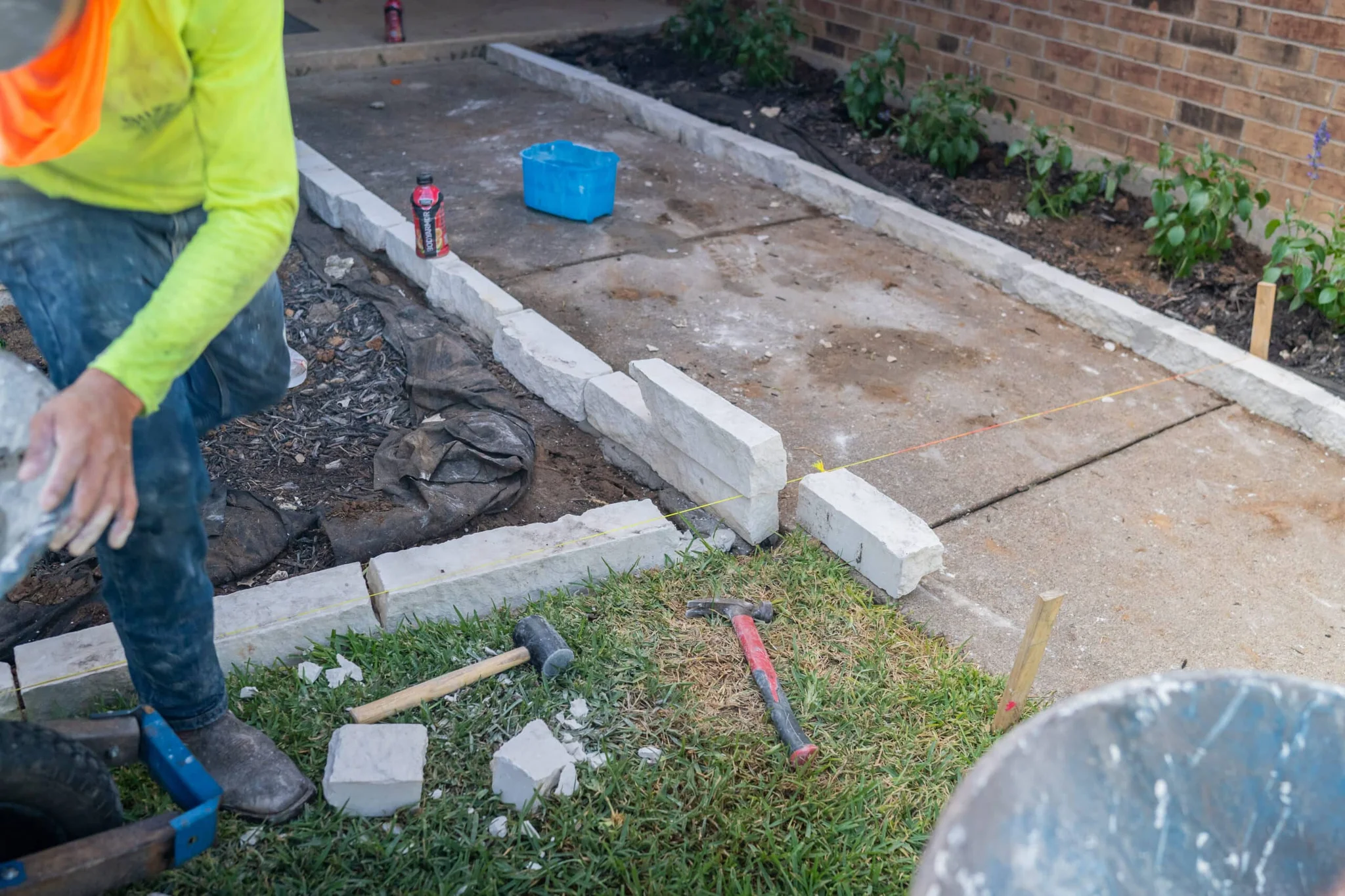 Hardscaping with Purpose: How to Use Stone Features to Guide Foot Traffic Naturally