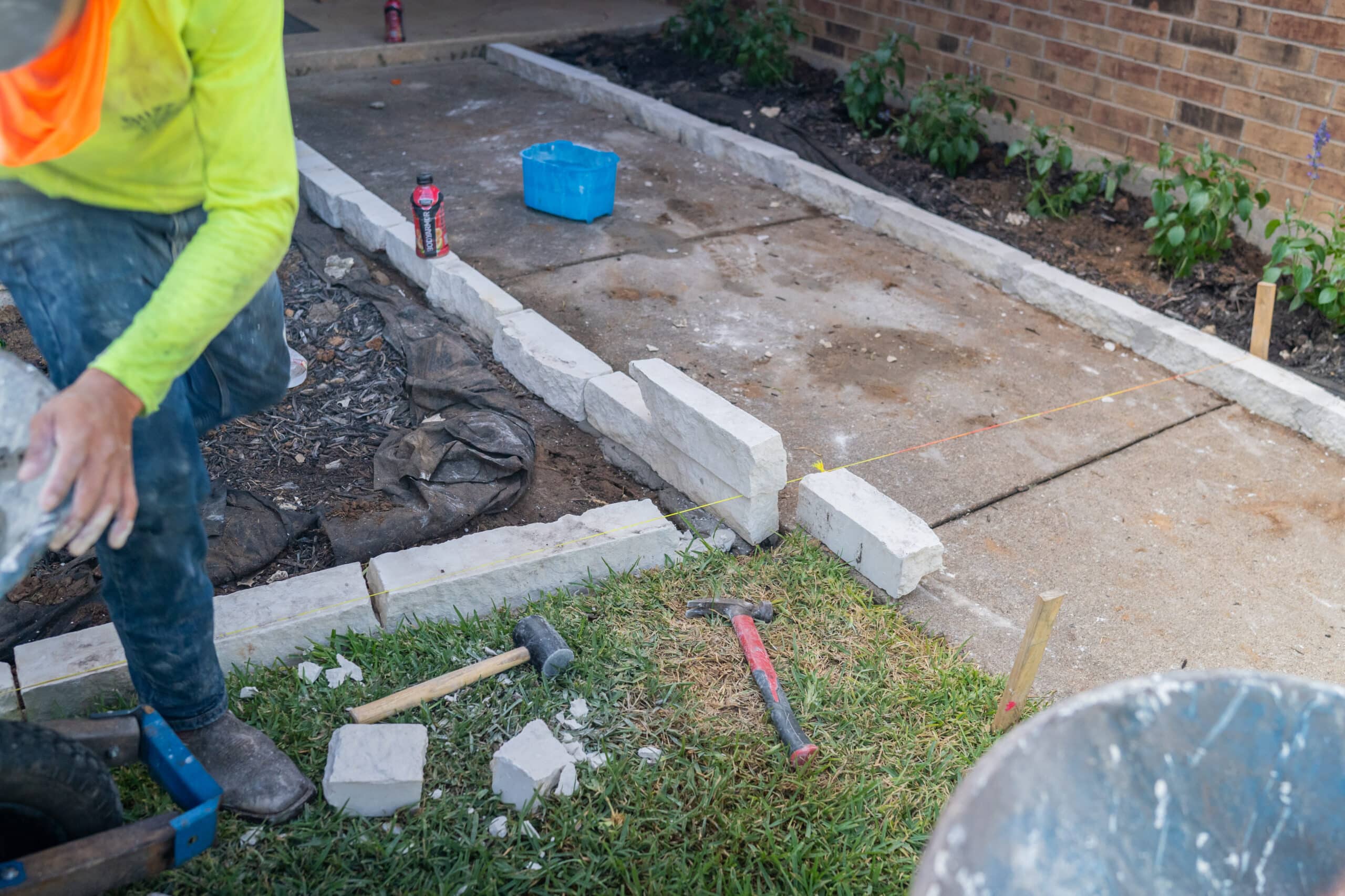 Hardscaping with Purpose: How to Use Stone Features to Guide Foot Traffic Naturally