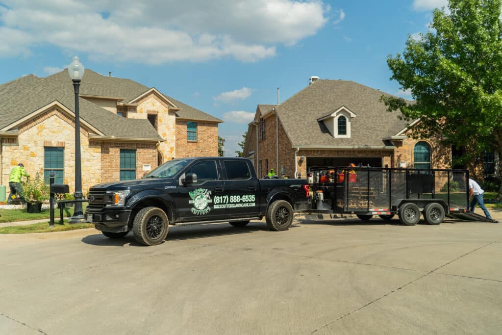 Landscaping team transforming a challenging yard into a healthy landscape